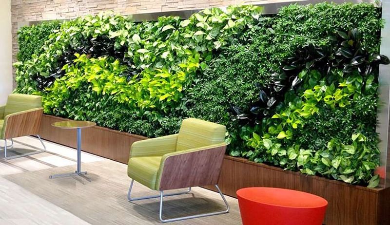 Living wall behind a lounge seating area